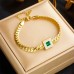 Gold Emerald set with crystal and emerald choker and necklace with bracelet